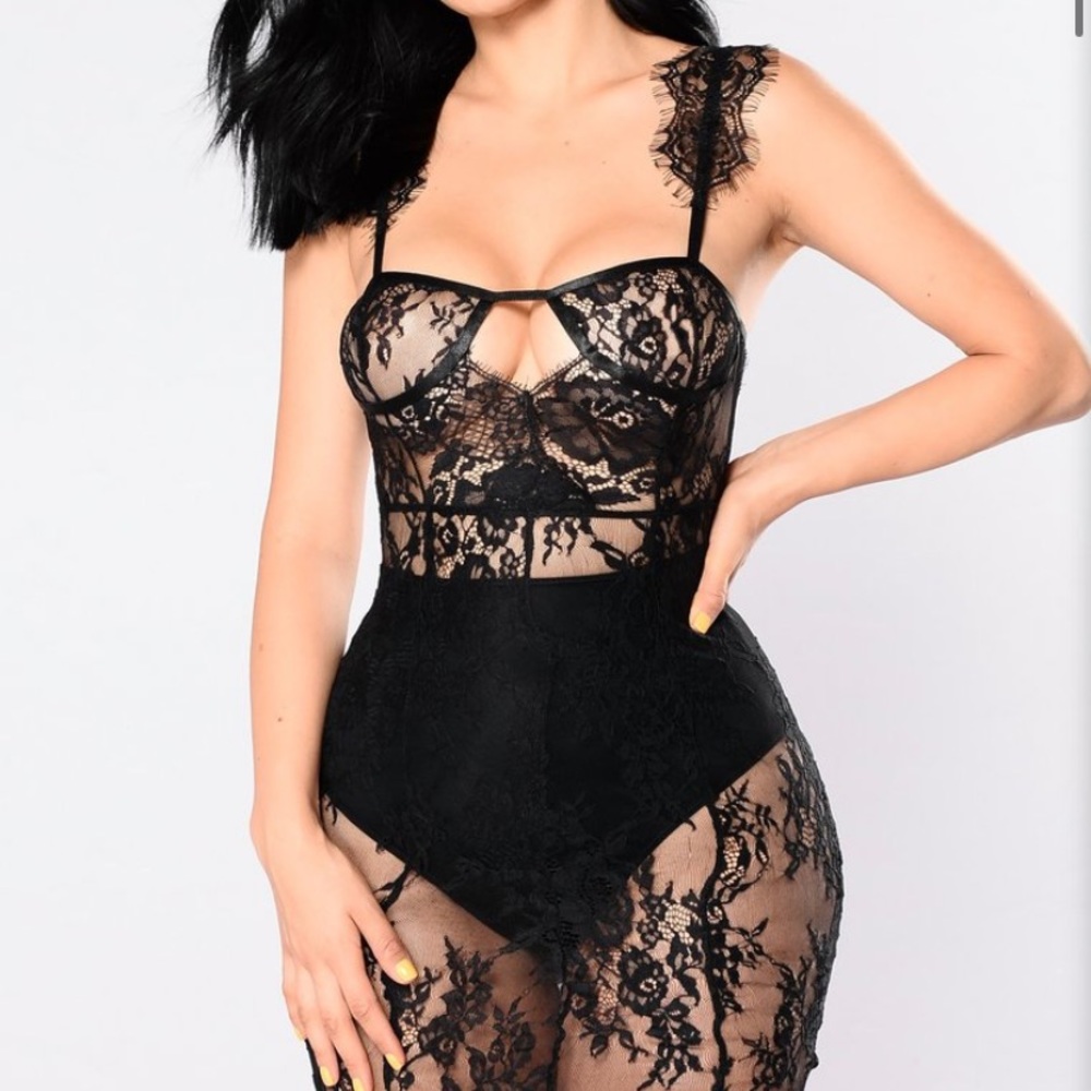 Black lace dress, with black panties.